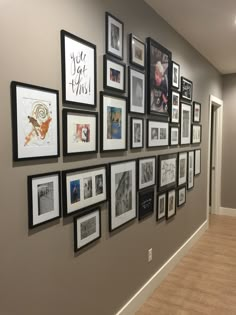 a wall with many pictures on it