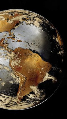 the earth is covered in gold and silver paint, as if it were from space