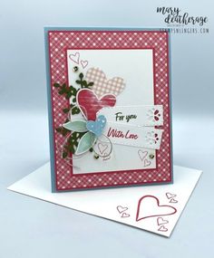 a close up of a card with hearts