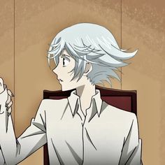 an anime character with white hair sitting in a chair and pointing at something on the wall