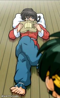 an anime character laying on the floor reading a book with another person looking at him