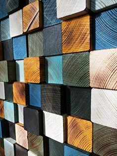 a wall made out of wooden planks with different colors