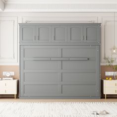 a large gray cabinet in the middle of a room with white walls and flooring