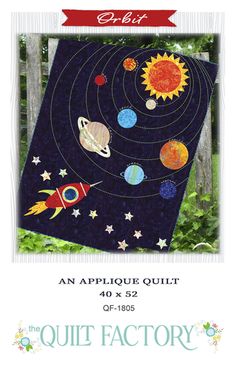 an applique quilt featuring the solar system