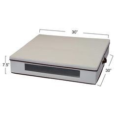 a white electronic scale with measurements for the top and bottom portion on it's sides