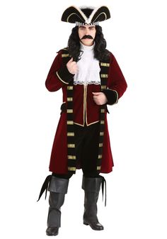 a man in a pirate costume standing with his hands on his hips and pointing to the side