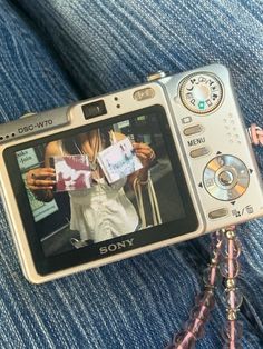 a person holding a camera in their hand