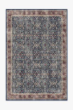 a blue and red area rug with an intricate design on the center, in front of a white background