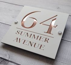 A contemporary house sign that will put the finishing touch to the front of your home. This door number sign is made from a 3mm white or black acrylic with an contrasting 3mm coloured acrylic backing. There are several choices of backing colours which are mirrored silver, gold, rose gold, mirrored red, mirrored blue or orange. All materials are UV stable and weather resistant making this modern house sign one of the toughest on the market. The photos don't do them justice - they are stunning! 30 x 30cm size sign comes with 4 fixings in the corners. Home signs are supplied with all fixtures and fittings with everything you need to install yourself. Dispatched within 1-3 working days. House Number Ideas Outdoor, Front Door Numbers, Door Number Sign, Door Number Plaques, Signage Board, Name Plates For Home, House Plaques, House Number Plaque, Door Number