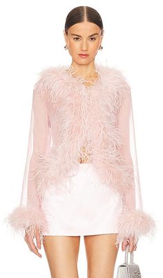 Find BUBISH Gigi Feather Blouse on Editorialist. Bubish Gigi Feather Blouse in Blush. - size 10/M (also in 8/S) Bubish Gigi Feather Blouse in Blush. - size 10/M (also in 8/S) Self: 100% polyester Contrast Fabric: 100% real dyed ostrich feather. Made in China. Hand wash. Front hook and eye closure. Chiffon fabric with feather trim. BUBR-WS12. GIGI. bubish is sophisticated. bubish is timeless. bubish is sustainable. The bubish range is diverse and thoughtfully designed to ensure every woman feels sophisticated, elegant and confident in their special piece. With varied styles, cuts and colors, they want bubish customers to be and look unapologetically themselves. Quality is integral, and their beautiful pieces are made to last a life time, not just a season. Handcrafted with responsibly sourc Pink Brunch Outfit, Bday Brunch, Feather Blouse, Nyc Outfits, Evening Blouses, Feather Tops, Evening Tops, Feather Trim, Ostrich Feather