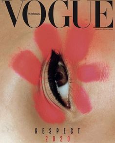 a woman's eye with red lipstick on the cover of magazine vosquee