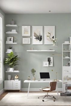 a home office with green walls and pictures on the wall above the desk, along with a white chair