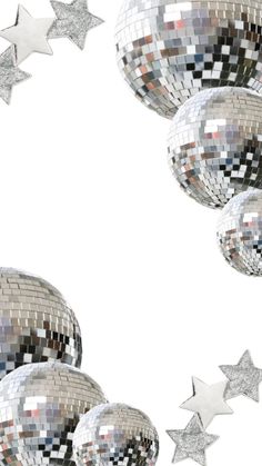 silver disco balls and stars are flying in the air