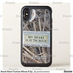 an iphone case with the words, my heart is at the beach