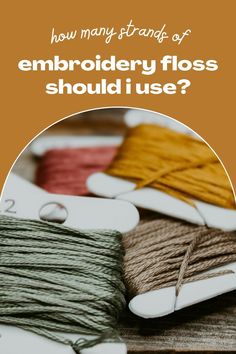 several spools of thread with the words how many strands of embroidery floss should i use?