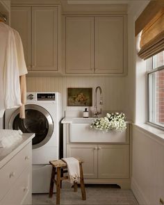 a washer and dryer in a small room