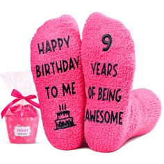 two pink slippers with the words happy birthday to me and an awesome gift bag