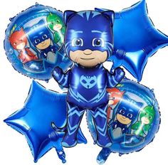 a bunch of balloons that are shaped like the characters of batman and catwomans