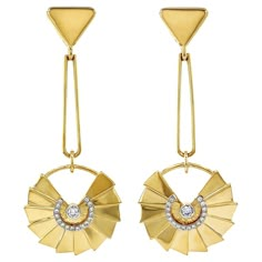 18k yellow gold triangles are the focus of these earrings. Beginning with an upturned triangle, a folded slender wire serves as a graceful, tapered link to a descending fan. With a circular wire base, layered triangles illustrate a spread fan. A half circle of brilliant cut diamonds revolve around a single diamond for an ornamented center. The total weight of the diamonds are 0.4 carats. Friction posts complete the earrings, which measure 1.03 inches (width) by 2.4 inches (length) by 0.21 inches Egyptian Inspired Jewelry, Movie Jewelry, Architectural Jewelry, India Inspired, Egyptian Inspired, Fan Jewelry, Jewellery Board, David Webb, Jewelry Design Drawing