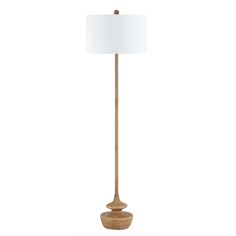 a wooden floor lamp with a white shade