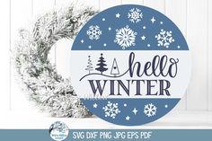 a christmas wreath with the words hello winter on it and snowflakes around it