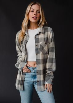 The softest flannel you'll ever own! Our new gray and cream super soft plaid flannel is a must have for your fall and winter wardrobe. Gray and cream super soft plaid flannel Long sleeves Button closure on the front Designed in the U.S.A. Produced in China. Model is wearing a size small  100% Cotton SIZE CHART S: Bust: 40" / Length: 24.5" M: Bust: 42" / Length: 25.5" L: Bust: 44" / Length: 26.5" XL: Bust: 46" / Length: 27.5" Flannel Sweatshirt, Blouses Vintage, Fall Flannel, Closet Goals, Flannel Women, Long Jumpsuits, Soft Flannel, Vintage Sweatshirt, Plaid Flannel