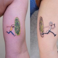 two people with tattoos on their arms holding onto each other's legs, one has a green and yellow design