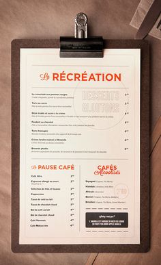 a clipboard with a menu attached to it