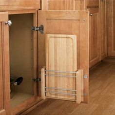 an open cabinet door in a kitchen