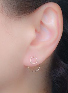 A Pair of Gold Circle Ear Jackets Earrings. Delicate and elegant pair of handcrafted ear jacket earrings, made from a 14k gold filled wire. ► One that looks like TWO → A single earring designed to have the presence as you are wearing 2 earrings. ► Super easy to wear: Thread the large circle end through the front of your piercing until the small circle is on your lobe. Earrings size: Front circle (6mm), Backward circle (12mm) ►Available also in STERLING SILVER and 14K ROSE GOLD FILLED. o o o o Ni Lobe Earrings, Gold Ear Jacket, Double Earrings, Jacket Earrings, Front Back Earrings, Earrings Circle, Ear Jacket Earring, Earring Jackets, 2 Earrings