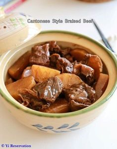 a close up of a bowl of food on a table