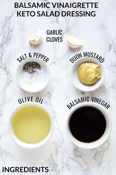 ingredients to make balsamic vinagrette keto salad dressing on a marble countertop