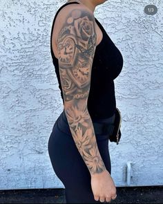 a woman with tattoos on her arm and leg