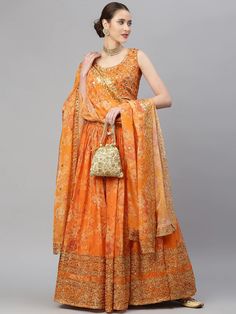 Orange and gold-toned embellished lehenga choli with dupatta, sequinned
Orange and gold-toned embellished unstitched blouse, has a round neck, sleeveless, zip closure
Orange and gold-toned printed semi-stitched lehenga, has drawstring closure, flared hem
Orange and gold-toned printed dupatta, solid border
Size & Fit
Choli at Bust: Customizable upto 42
Lehenga waist: Customizable upto 38
Lehenga Length: 41 inches
Lehenga Flare: 4.00meter
Dupatta Length: 2.55 meter
Dupatta Width: 1.05 meter
Ma Embroidered Gold Palazzo Set With Traditional Drape, Gold Embellished Embroidered Fabric For Designer Wear, Gold Embellished Dola Silk Anarkali Set, Embellished Gold Dola Silk Anarkali Set, Orange Mirror Work Dupatta For Reception, Embellished Chanderi Sharara For Navratri, Gold Embellished Semi-stitched Lehenga, Navratri Embellished Chanderi Sharara, Embellished Gold Dola Silk Dupatta