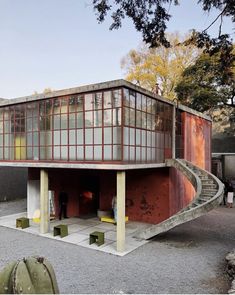 an unusual building with stairs leading up to it