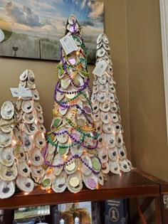 a christmas tree made out of seashells on a table