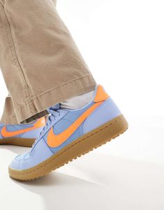 Sneakers by Nike A pop of color Low-profile Lace-up fastening Padded tongue and cuff Signature Nike branding Gum sole Textured grip tread Orange Trends, Nike Air Max Jordan, Nike A, Nike Branding, Fall Lookbook, Purple And Orange, Spring Floral Dress, Leggings Sale, Long Black Dress