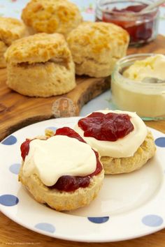 biscuits with jam and cream on a plate