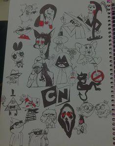 an open notebook with cartoon characters drawn on it