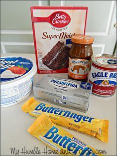 the ingredients for an ice cream dessert are displayed on a table with other items in front of it