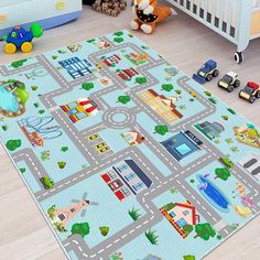 a child's play mat with cars and trucks on it in a nursery room