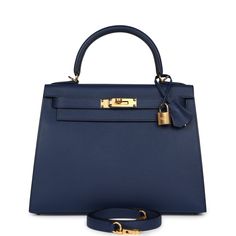 This Kelly, in the Sellier style, is in Bleu Navy epsom leather with gold hardware, has tonal stitching, front flap, two straps with center toggle closure, clochette with lock and two keys, single rolled handle and removable shoulder strap.The interior is lined with Bleu Navy chevre leather and has one zip pocket with an Hermes engraved pull and two open pockets on the opposite side.Collection: WOrigin: FranceCondition: New and never worn (plastic on hardware)Accompanied by: Hermes box, Hermes d Blue Bags With Lock For Formal Occasions, Blue Formal Bag With Turn-lock Closure, Hermes Kelly Sellier, Hermes Kelly 25, Kelly Sellier, Mini Kelly, Hermes Kelly 28, Hermes Birkin 25, Hermes Box