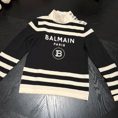 Balmain Paris Panda Sweater New Never Used New Condition White Logo Print Sweater For Fall, Luxury Long Sleeve Sweater With Logo Print, Luxury Logo Print Sweater For Fall, Winter White Logo Print Sweater, White Logo Print Sweater For Winter, Winter White Sweater With Logo Print, White Sweater With Logo Print For Winter, Luxury Logo Print Sweater For Winter, Luxury Winter Sweater With Logo Print