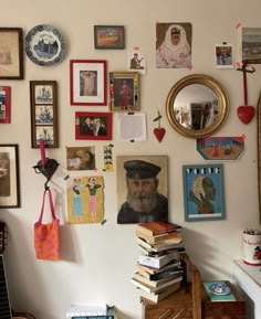 a wall covered with pictures and other items