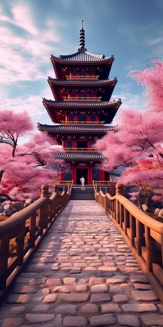 the pagoda is surrounded by pink trees and cobblestone walkways that lead up to it