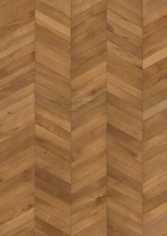 an image of wood flooring that looks like herringbones or chevron boards