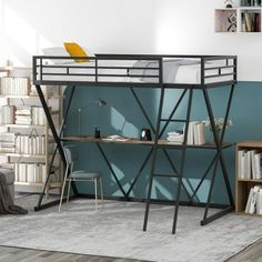 a loft bed with a desk underneath it in a room filled with books and furniture