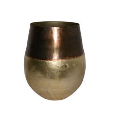 a gold and black vase on a white background