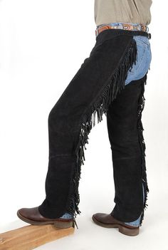 Premium cowhide suede with all double needle construction and heavy-duty aluminum zippers for extra-long wear. Buckle adjustments in front and back ensure a perfect fit. Western cut to fit over boots. Excellent for schooling, trail, or even beginning show riding. Extra-long length allows these chaps to be tailored to fit the individual. Fringe Chaps, Cowgirl Chaps, Shotgun Chaps, Cowboy Chaps, Cowgirl Tuff Jeans, Western Chaps, Biker Outfit, Western Boot, Leather Fringe