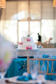 a wedding cake sitting on top of a table